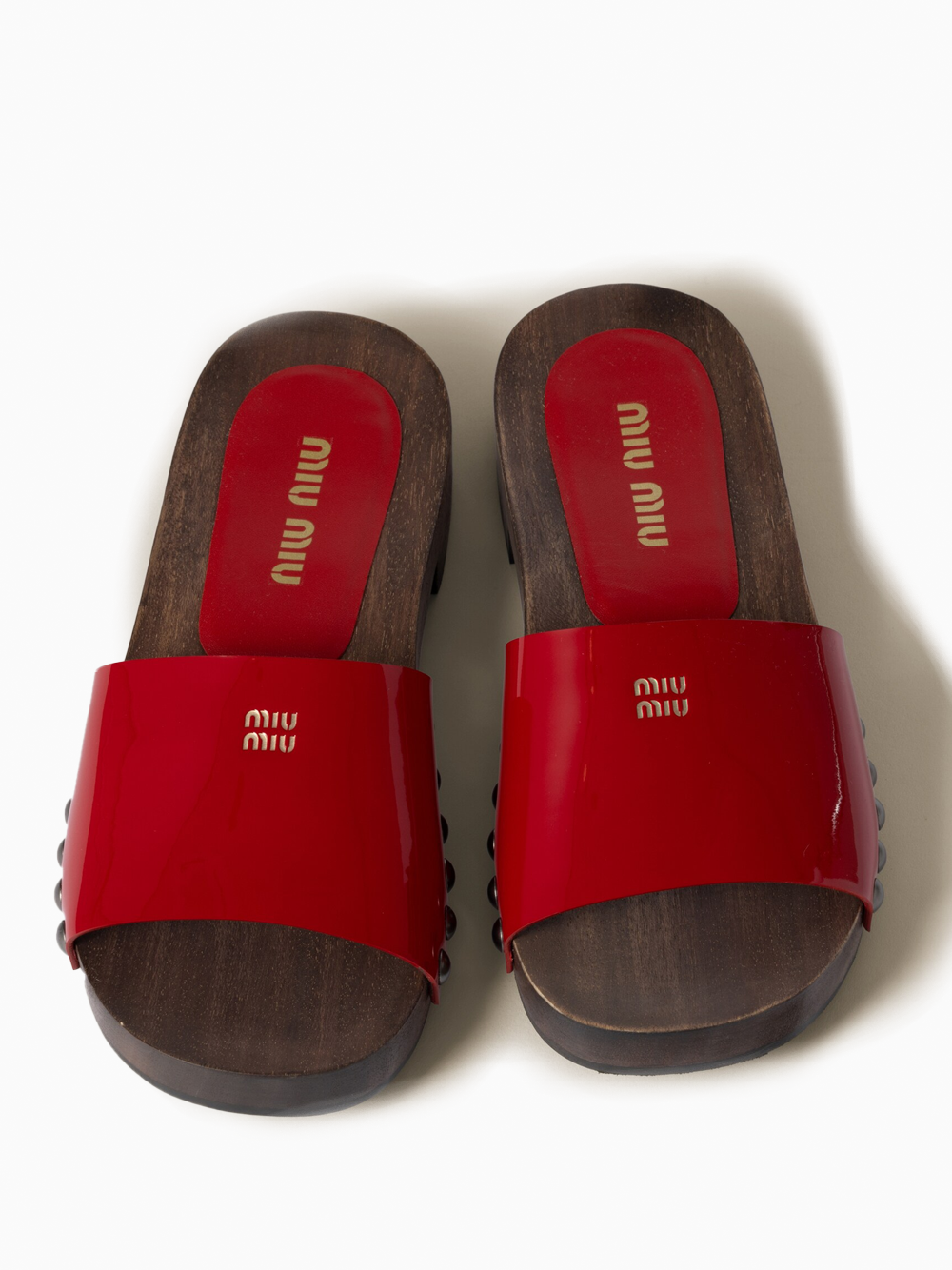 Patent leather clogs