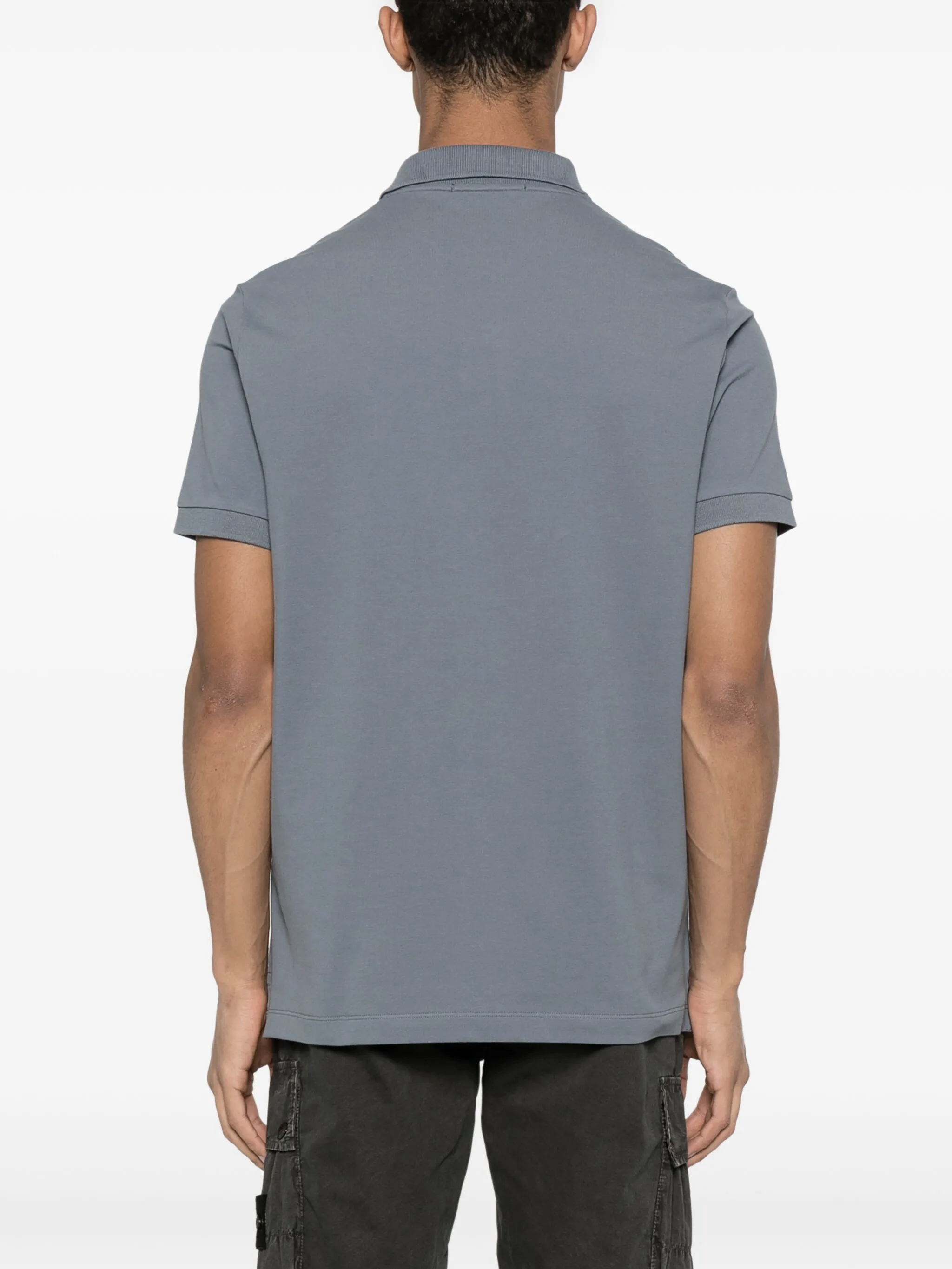 Polo con parche Compass