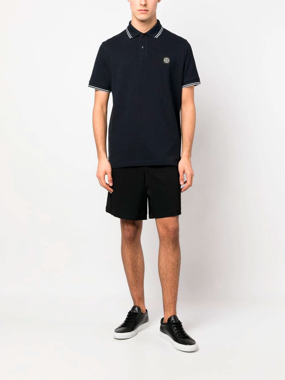 Polo con parche Compass