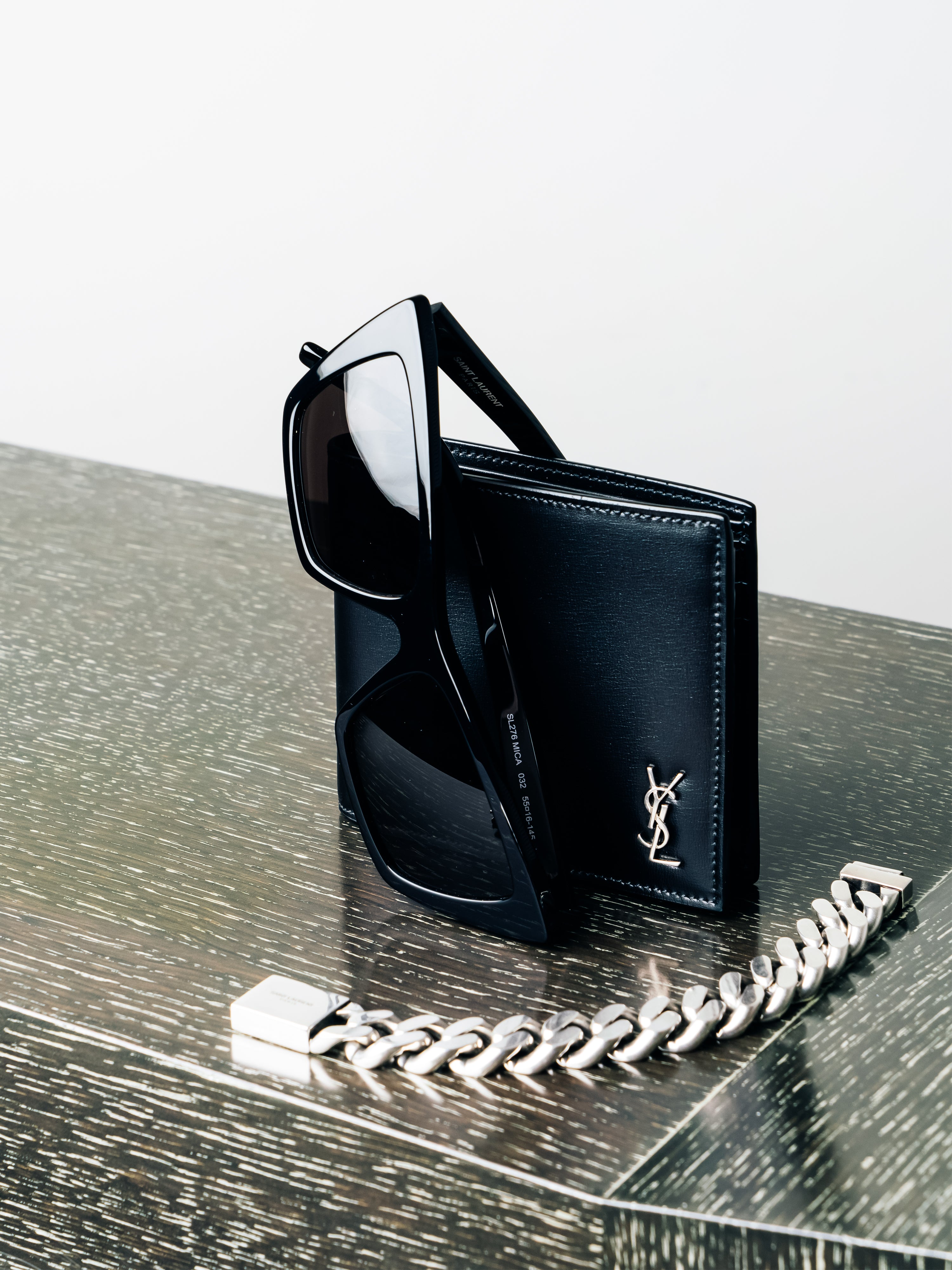 Browse a selection of men's accessories from international luxury fashion brands