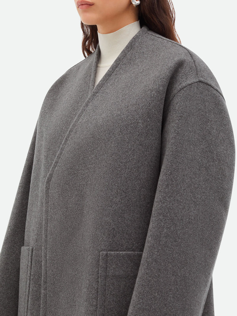 Collarless cashmere coat