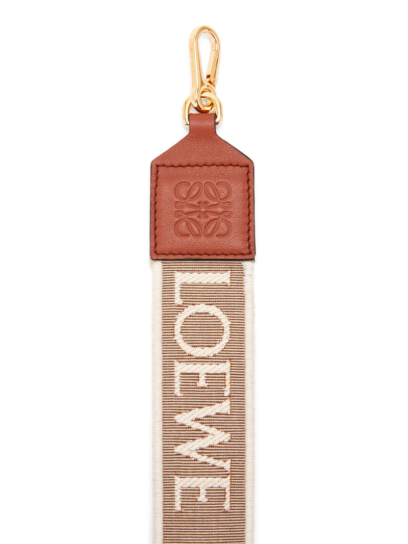 Anagram strap in jacquard and leather