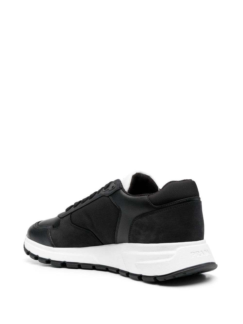 Logo-plaque low-top sneakers | Prada | OTTODISANPIETRO