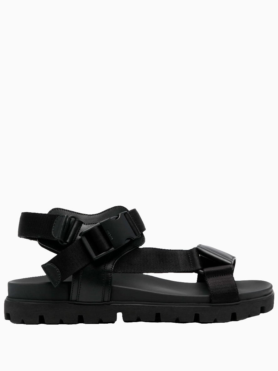 Buckle-fastening sandals