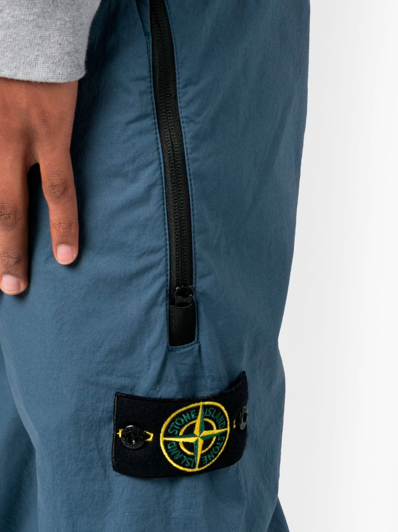 Compass-patch track pants