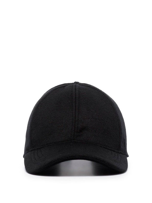Curved-peak baseball cap