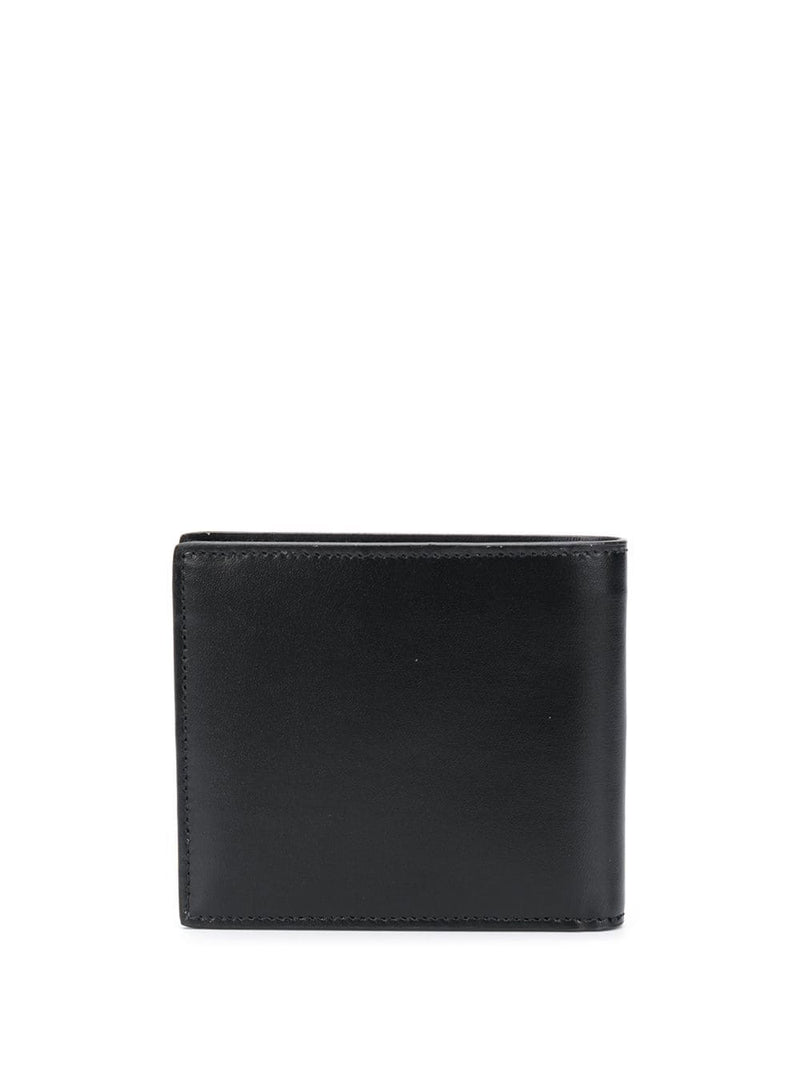 Tiny Monogram East/West wallet in matte leather